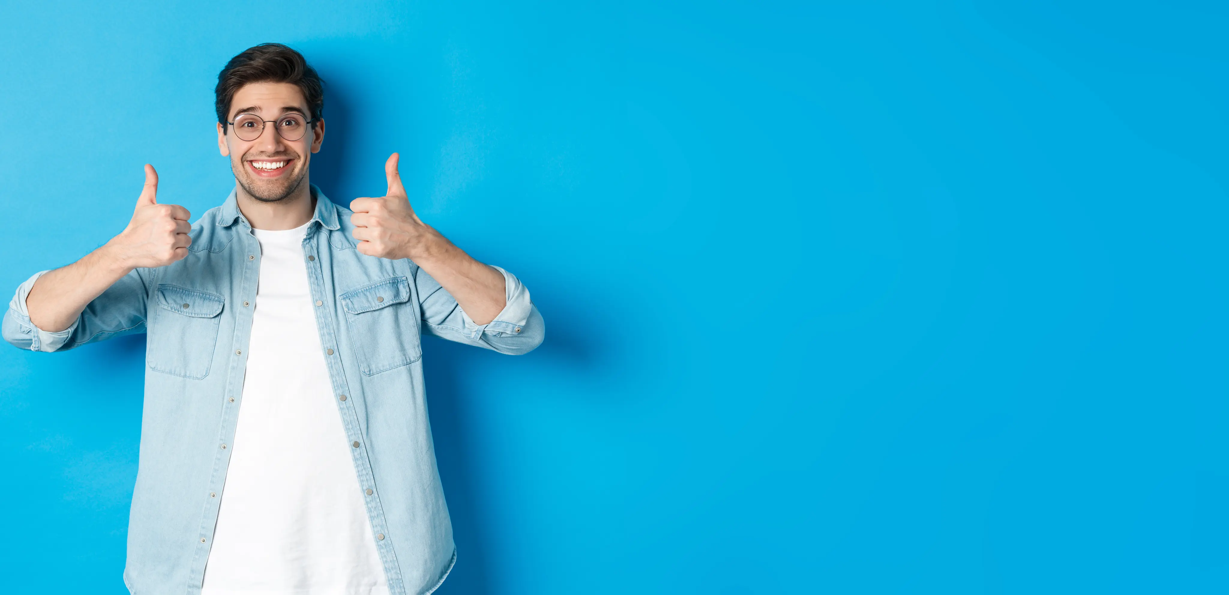 Happy man giving thumbs up